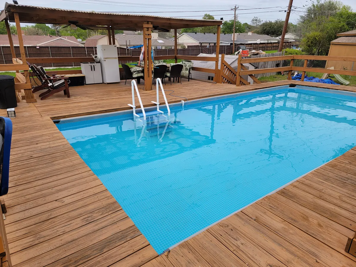 Finished pool deck and covered outdoor living area